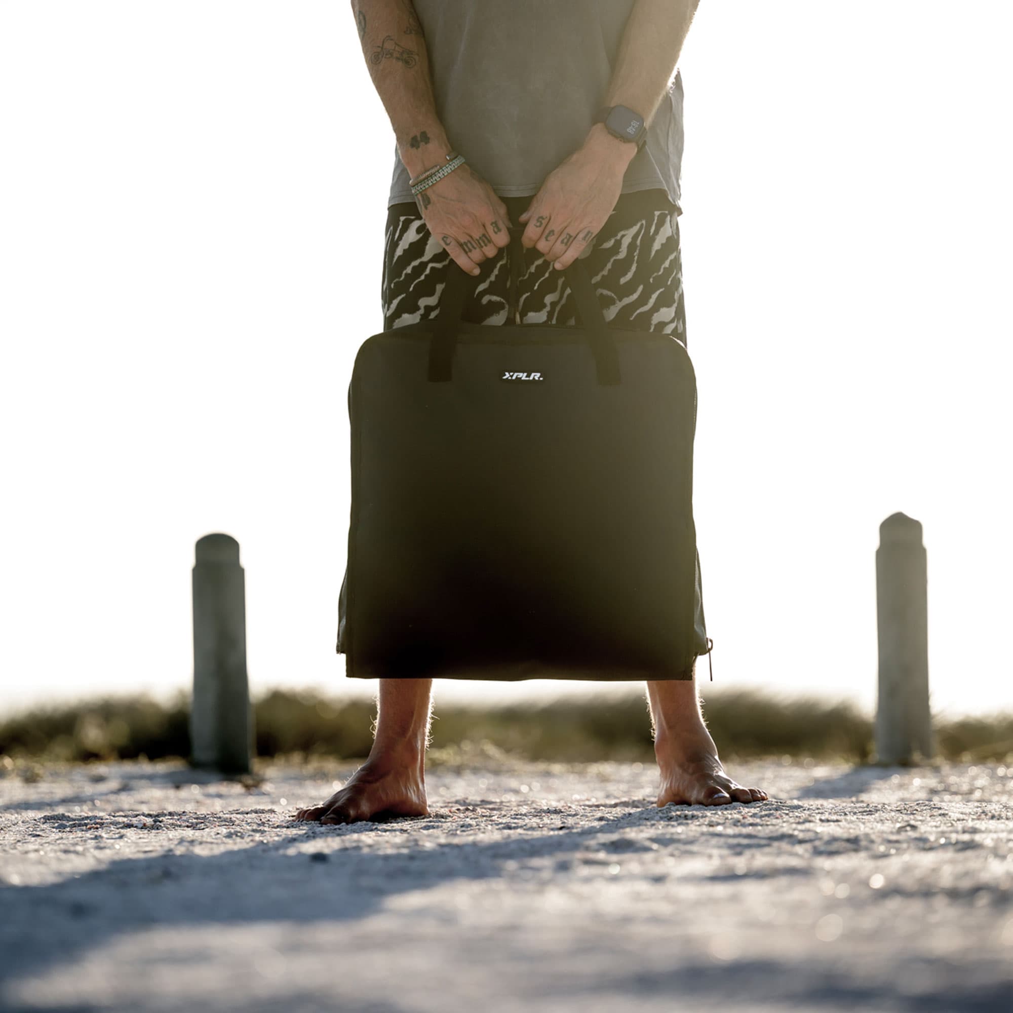 Overlanding truck campsite with rooftop tent at dusk